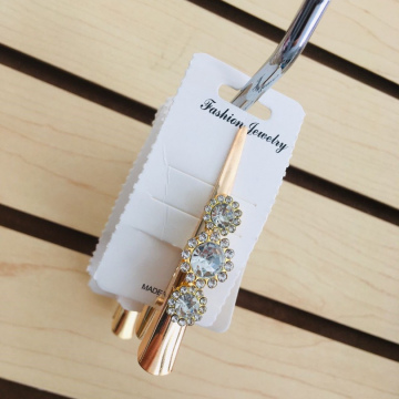 Pinza pico de garza para cabello